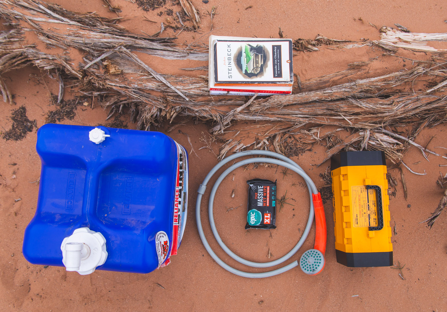 Alexandra's five things posed on orange sand of the Utah desert